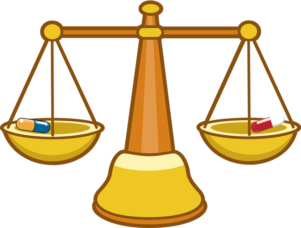 Vægtskål med to piller